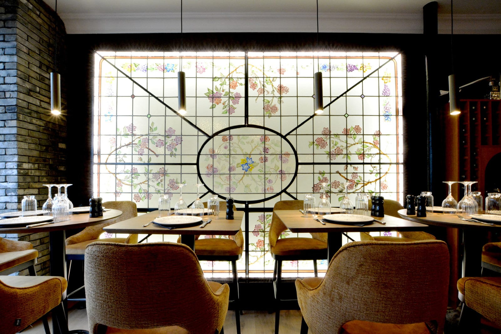Backlit stained-glass panel with floral motifs